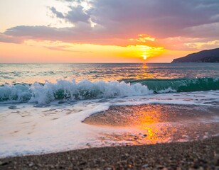 Vibrant sunset over calm ocean waves gently lapping a pebbled beach