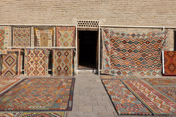 the carpet on sale outside Toqi Sarrofon which in Persian as money changers dome