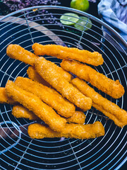 Crispy mozzarella cheese sticks with golden crust and gooey melted cheese inside.