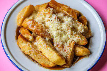 Chunky Chips With Melted Cheese And Gravy