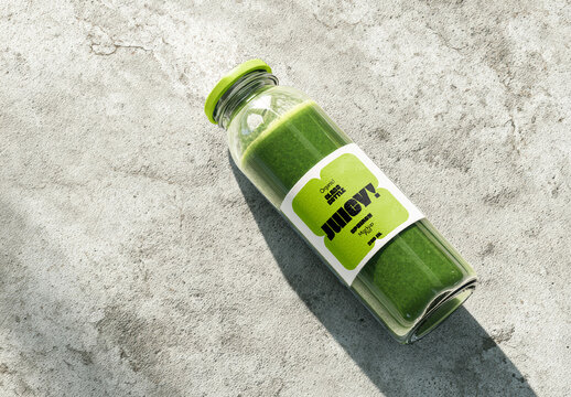 Glass Bottle Green Smoothie Mockup on Concrete