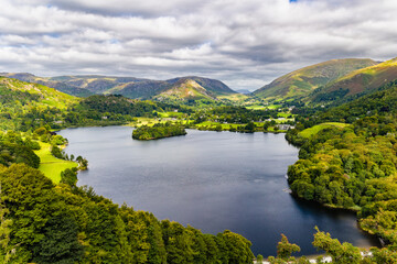 Dramatic summer clouds and sunshine over the Grasmere valley, Lake District National Park