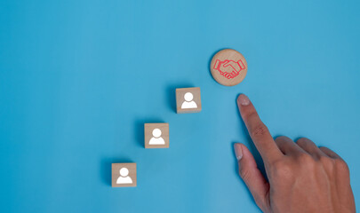 Cubes with handshake symbol. Business agreement between different parties. Business deal,...