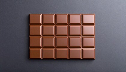 Fototapeta premium A Delicious Milk Chocolate Bar with Many Squares.