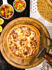 Bacon cheese pizza with melted cheese topping, delicious and savory.