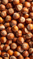 Obraz premium Abundant Hazelnut Harvest Rich Brown Nuts Texture Background.