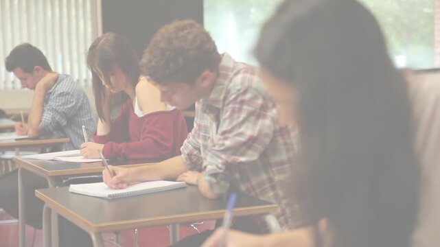 Animation of light background over diverse students during exam