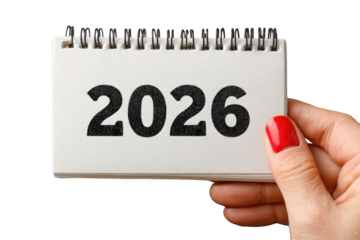 Hand holding a small calendar, year 2026 displayed