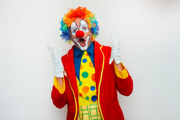 Surprised clown with open hands