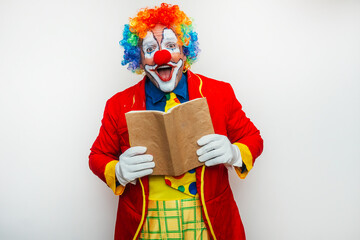 A Clown reading a book