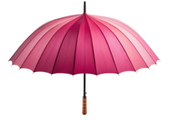 Close-up view of a vibrant pink umbrella with scalloped edges on a