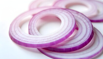 Close-up of fresh onion slice rings isolated on a clean white background, studio lighting, sharp focus, showcasing the intricate layers and textures.