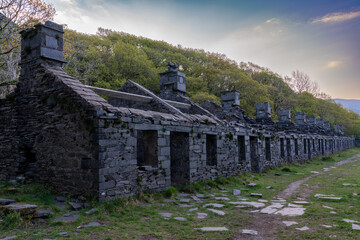 Row of derelict slate workers’ cottages known as Anglesey Barracks, part of the historic Dinorwic...