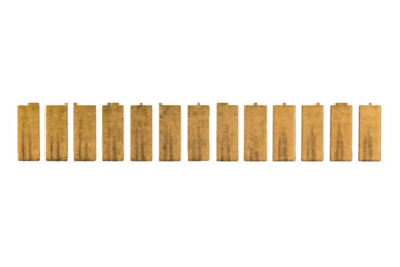 A row of worn golden metal pins is isolated.