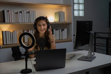Future of Work and Digital Interaction. Young woman smiling while streaming in a modern workspace.