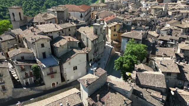 Pull-back aerial footage of the medieval Scanno town in L'Aquila, in the Abruzzo region, Italy