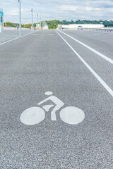 Bike path markings on the Pont Simone Veil bridge in Bordeaux, France