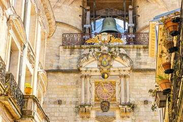 Coat of arms and clock of the Grosse Cloche in the center of Bordeaux France
