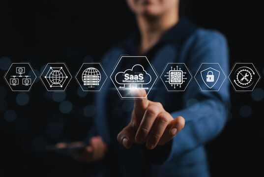 SaaS (Software as a Service) platform concept. User interacting with cloud technology icons, symbolizing digital transformation, software delivery, SaaS security, and cloud-based business solutions.