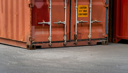 Close up Industrial Logistics Containers in Yard cargo container background at daytime. Logistics...