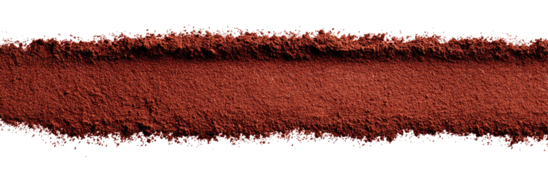 Streaked, textured, reddish-brown powder
