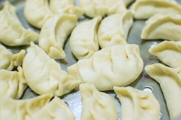 Close up of Momo, type of South Asian dumpling; native to Tibet, Nepal, Bhutan and Sikkim. It is...