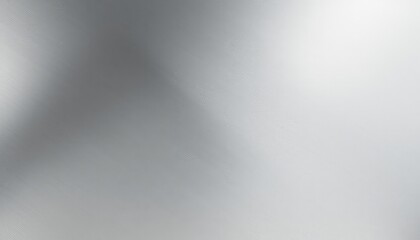 Subtle silver background with an elegant texture, shimmering with delicate light and shadow reflections, creating a modern and clean backdrop