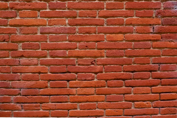Red Brick Wall Close-Up Showing Texture and Pattern