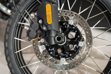 High-performance motorcycle braking system showcased at an automotive event in a modern exhibition...
