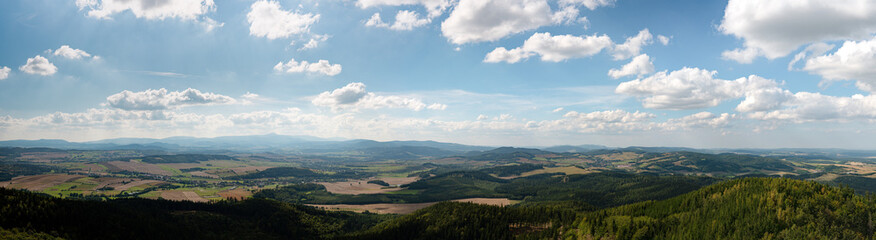 Panoramic view of the Karkonosze mountains with Sniezka mountain seen from the top of the observation tower on Trojgarb Mountain near the town of Jaczków.