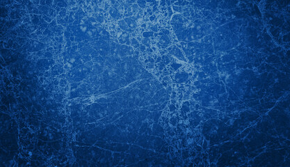 Blue marble texture background. High-quality natural stone with intricate white veins, ideal for elegant surfaces, flooring, and interior design projects. Close-up photo.