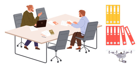 Two colleagues in conversation at a meeting table with laptops, papers, books, and office chairs. Nearby, colorful file folders and a Quadcopter highlight modern office tools. Ideal for teamwork