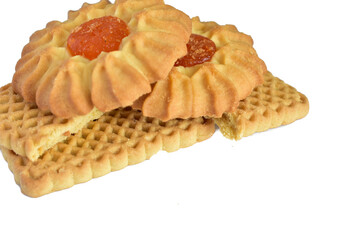 Shortcrust pastry cookies with jam lie on a PNG background.