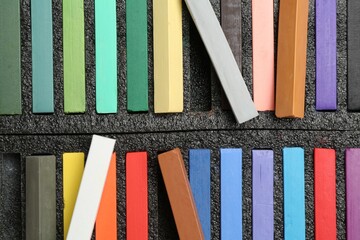 Set of colorful chalk pastels as background, closeup