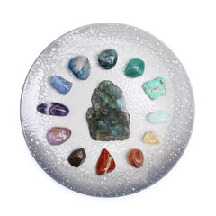 Many different healing stones isolated on white, top view