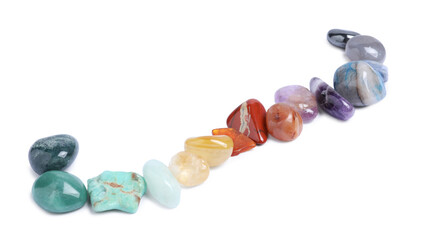 Many different healing stones isolated on white