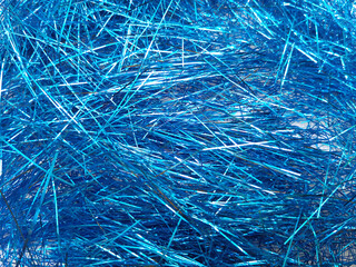 Blue foil tinsel background, Shimmer shiny blue tinsel shred festive, wedding, birthday party, Christmas decorations