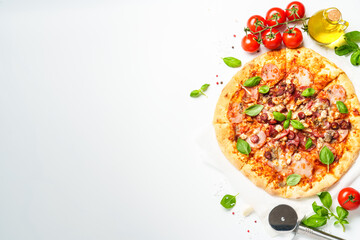 Delicious meat pizza with ham, salami and sausages.