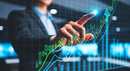 A business professional is interacting with a futuristic, holographic financial dashboard, showcasing stock market growth and data analysis against a backdrop of a modern city skyline