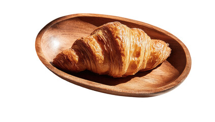 Golden croissant on a wooden oval dish