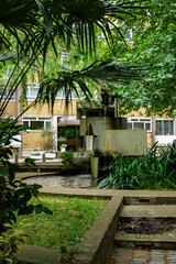 London - 06 24 2022: View of the fountain in the garden on Addison Road