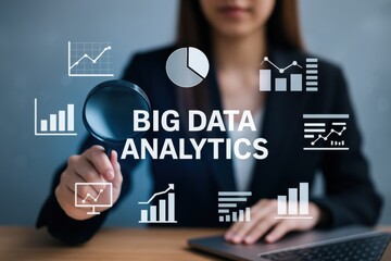 Businesswoman analyzing big data analytics with magnifying glass and laptop on desk