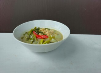 fresh salad in a bowl Sayur lodeh is Indonesian vegetable soup from Javanese cuisine,prepared from vegetables cooked in coconut milk