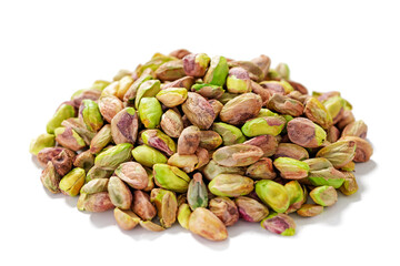 Heap of peeled Pistachio nuts isolated  on white background