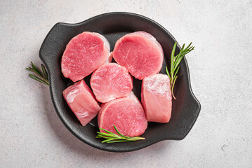 Raw uncooked pork tenderloin meat