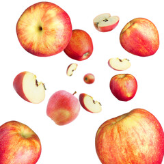 Fresh red apples swirling in air against white background