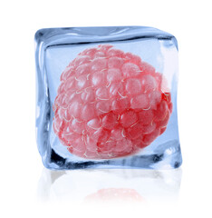 Ripe raspberry in ice cube on white background