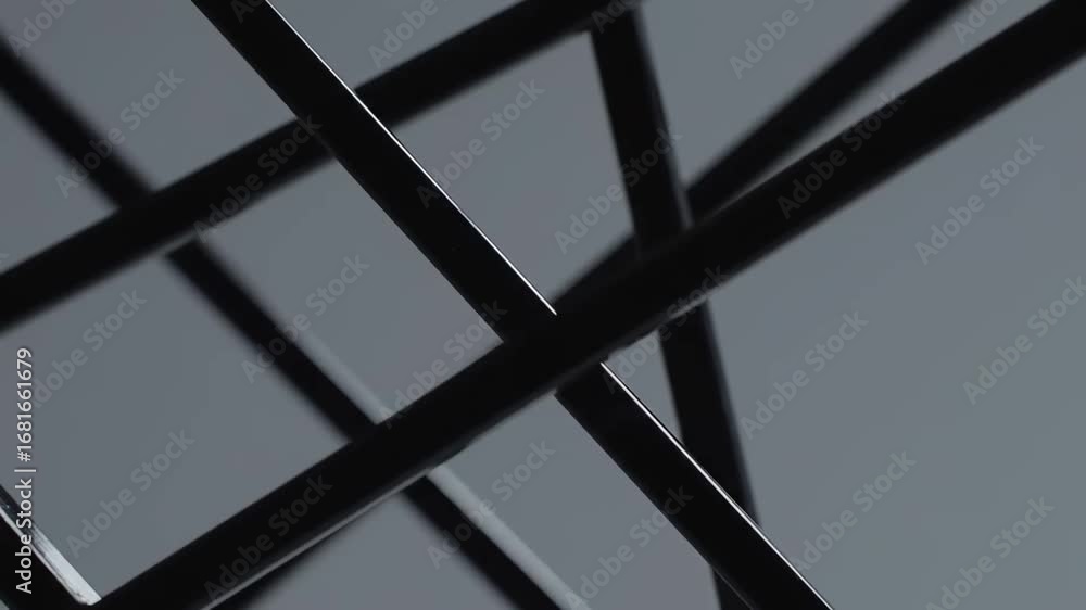 Poster abstract black geometric pattern - close-up shot of intersecting black lines forming a complex geome