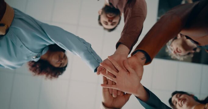 Corporate, people and meeting with handstack in office for teamwork, agreement and motivation. Below, staff and hands together for collaboration, company huddle and employees support for solidarity