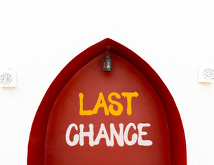 Last chance symbol. Concept word Last chance on beautiful white and red wall. Beautiful white and...